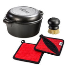 Set featuring the double dutch oven, round0black scrub brush, and two silicone-and-fabric potholders.