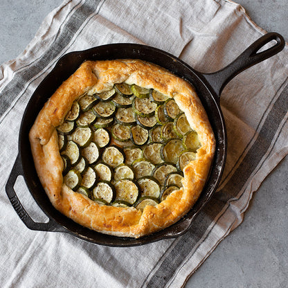 Our roasted zucchini and scallion galette, prepared and served in skillet.