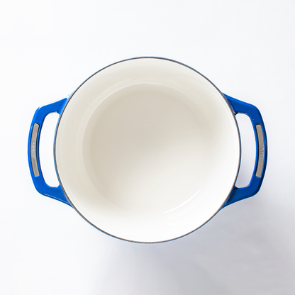 Inside of dutch oven, with a white enameled interior.