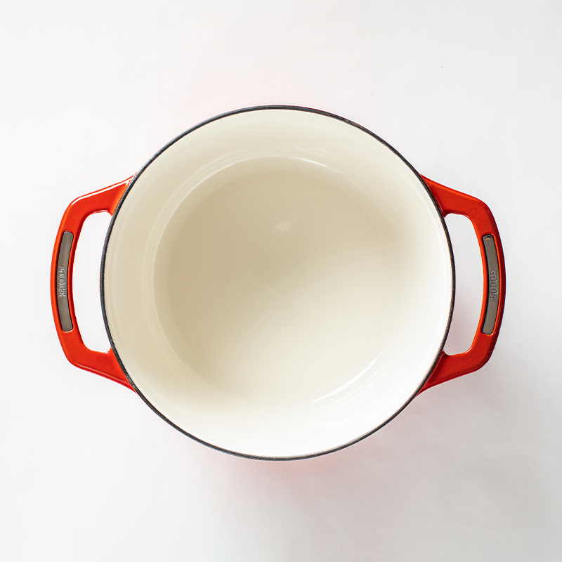 Inside of dutch oven, with a white enameled interior.