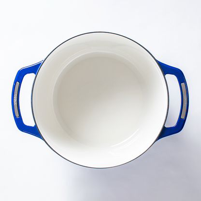 Inside of dutch oven, with a white enameled interior.