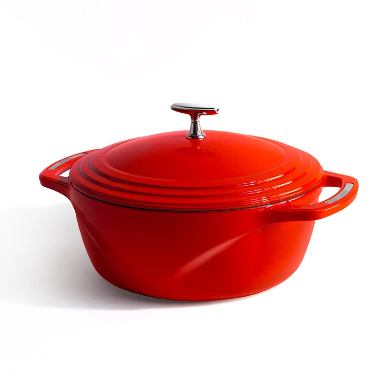 Red enameled cast iron Dutch oven with a lid on a white background