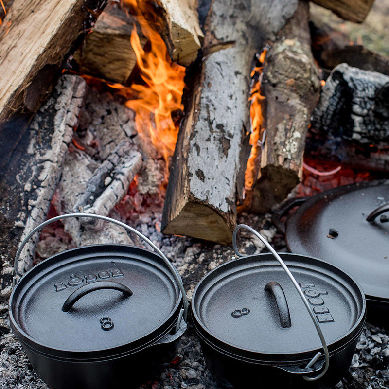 Dutch oven's near fire.