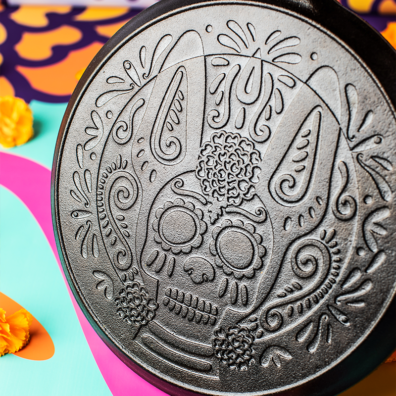 Close-up of engraved Xolo sugar skull design by Artist Lourdes Villagómez.