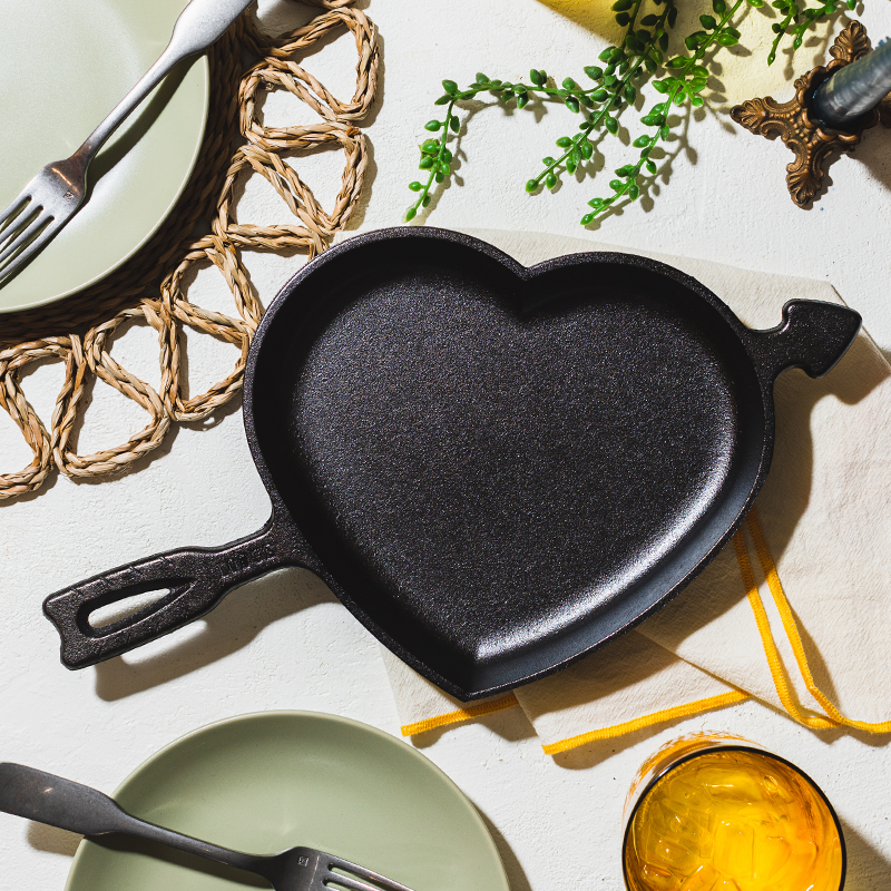 Heart shaped pan on kitchen table.