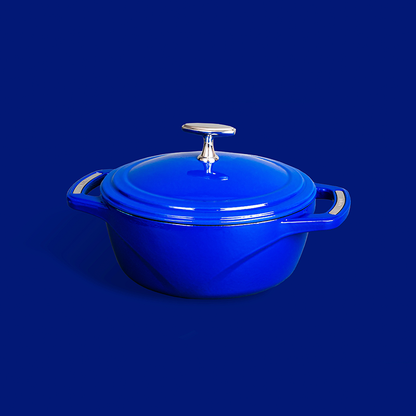 Blue dutch oven on blue background.
