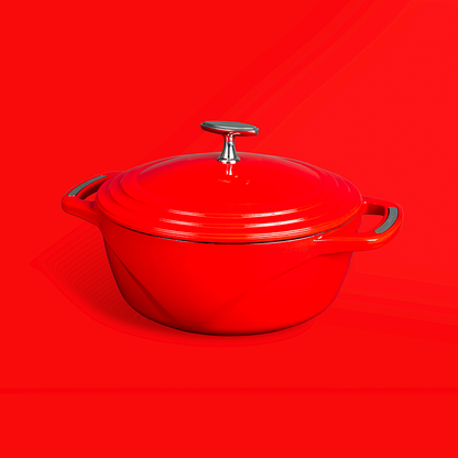 Red dutch oven on red background.