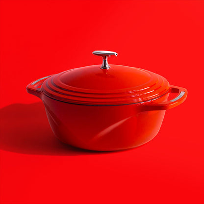 Red dutch oven on red background.