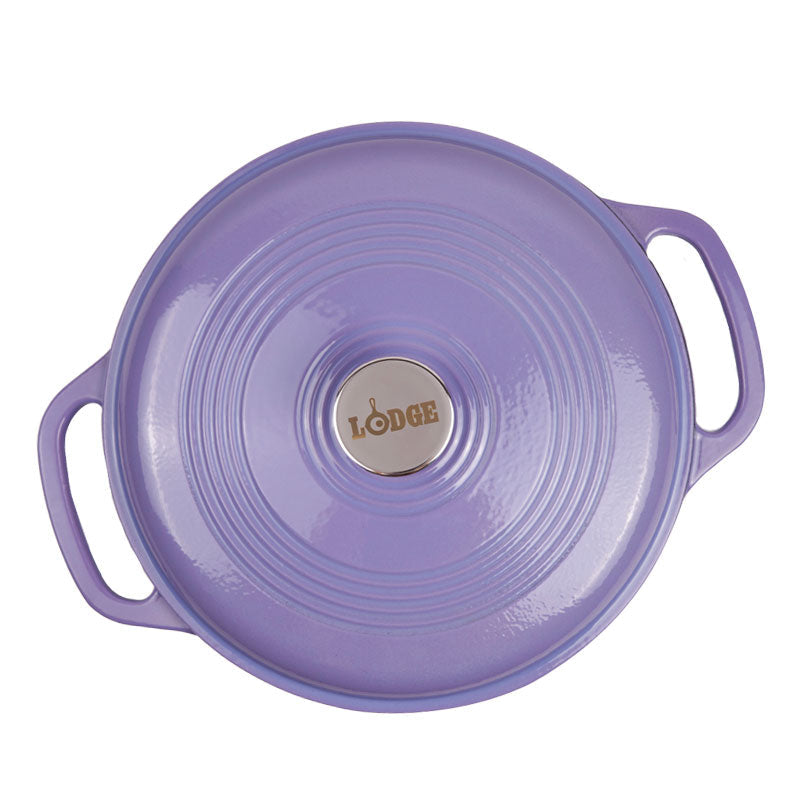 Top view of lid featuring silver knob with Lodge branding.