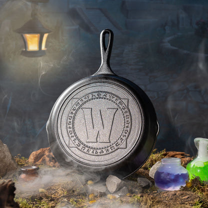 Skillet in a mystical setting with lantern and potions.