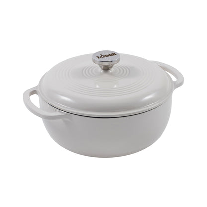 Oyster white enameled cast iron Dutch oven including a lid with silver knob.