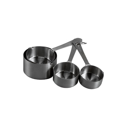 A set of stainless steel measuring cups in different sizes, with a long handle and spout for pouring.