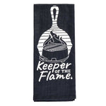 Black towel with a white grill and skillet graphic and 'Keeper of the Flame' white text.