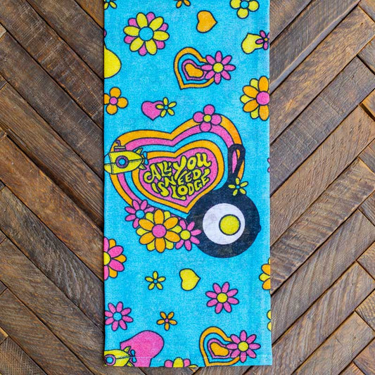 Towel on wooden counter.