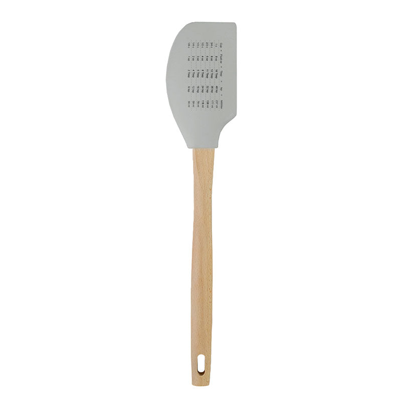 Back of spatula with a measurement conversion chart.