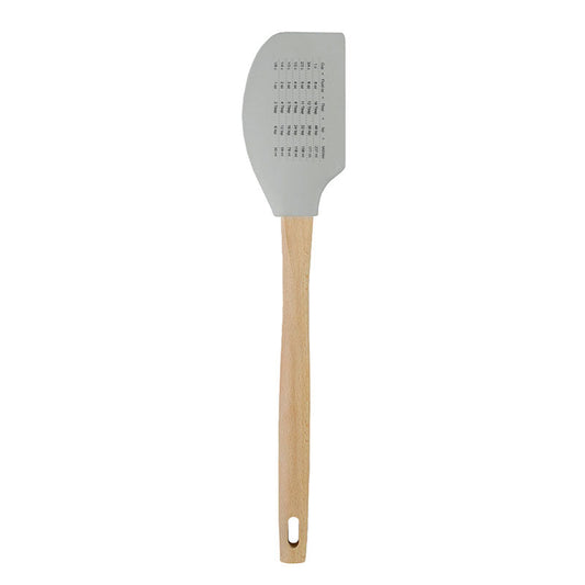 Back of spatula with a measurement conversion chart.