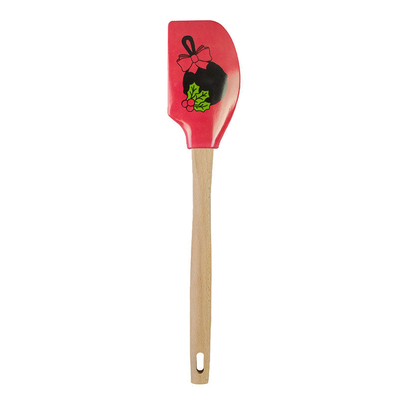 Red spatula with Christmas design on a white background