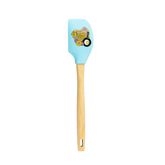 Spatula with a blue head with a heart graphic and wooden handle.
