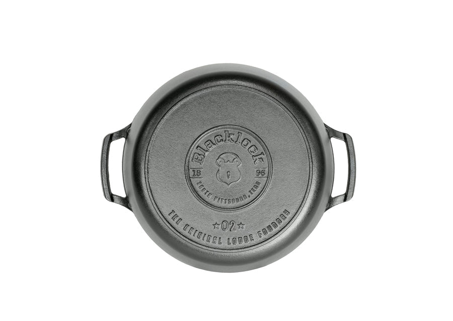 Bottom of dutch oven featuring Blacklock logo.