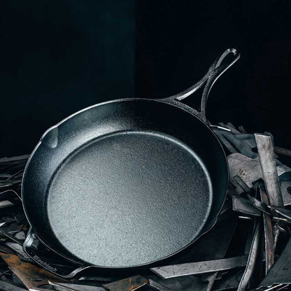12 inch skillet on a black background.