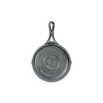 Bottom of skillet featuring the Blacklock collection logo.
