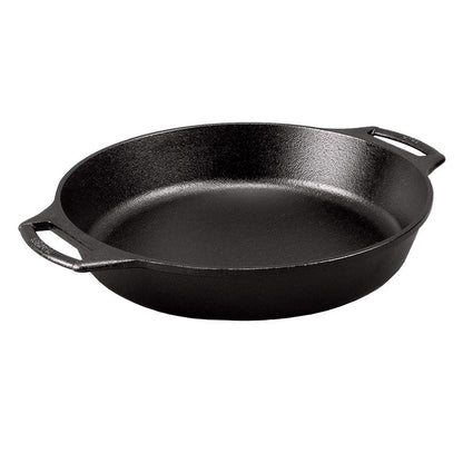 Black cast iron circular skillet with 2 loop handles.