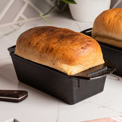 Freshly baked loaves presented in pan.