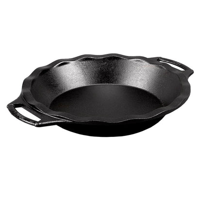 A black cast iron pie pan with two handles on the sides.