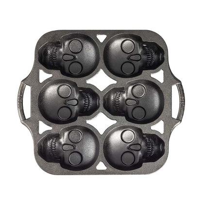 Mini cake pan with 6 skull shaped cups.