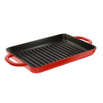 Enameled cast iron grill pan with a red exterior and black interior.