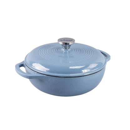 Storm blue enameled cast iron Dutch oven with lid on a white background
