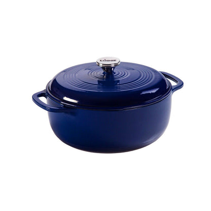 Indigo enameled cast iron Dutch oven with lid on a white background