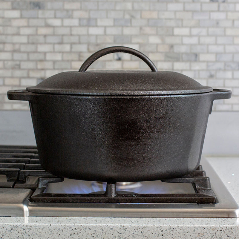 Dutch oven being used to cook on stovetop.