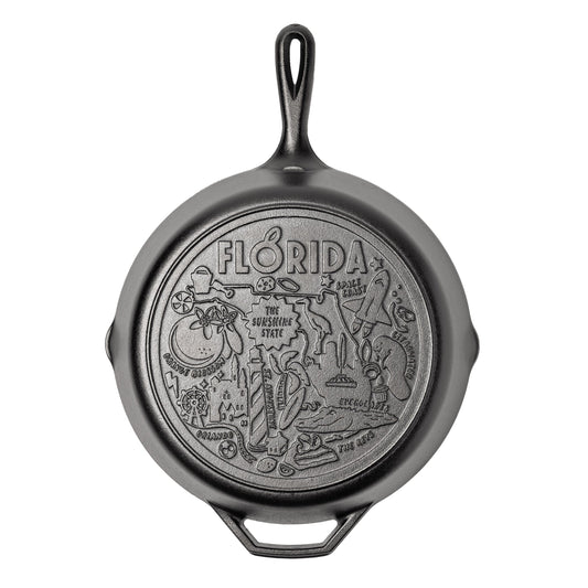 Cast iron skillet with the bottom engraved with beloved icons and monuments from Florida.