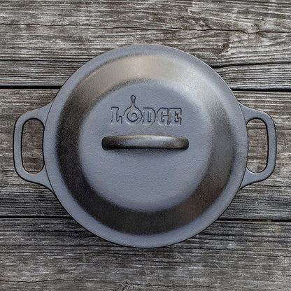 Top view of dutch oven with lid, featuring Lodge branding and lid handle.