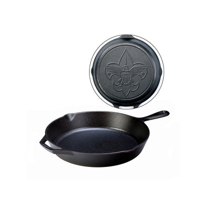 A black cast iron skillet with a long handle, loop handle, and 2 pour spouts, featuring a Boy Scout design on the back of skillet.