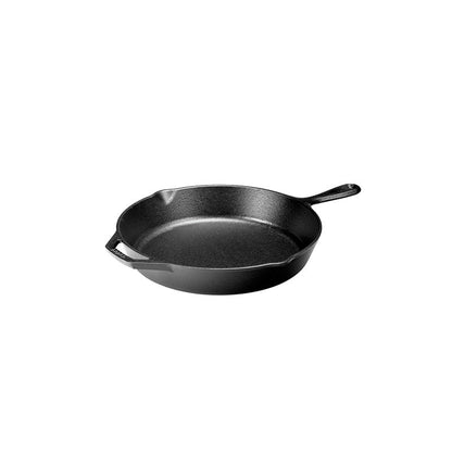 Angled shot of skillet featuring pour spouts and cooking surface.