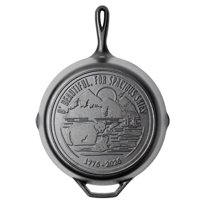 Cast iron skillet with back engraved featuring lyrics and imagery from America The Beautiful.