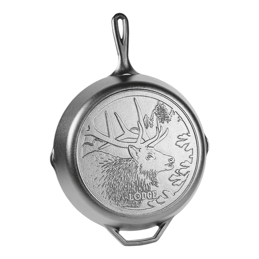 Skillet with engraved elk on back.