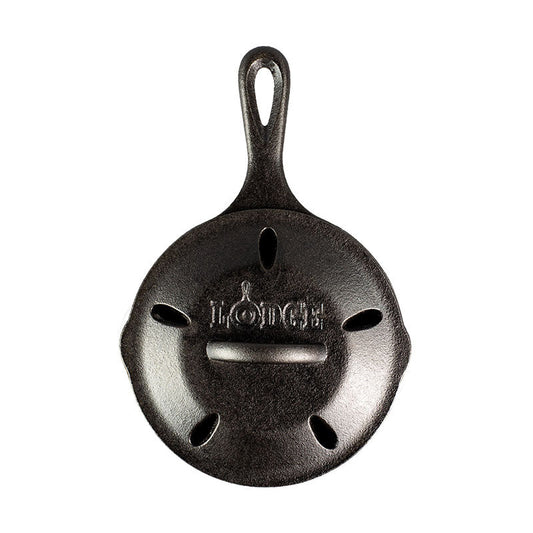 Cast iron skillet with lid which has holes to facilitate smoking.