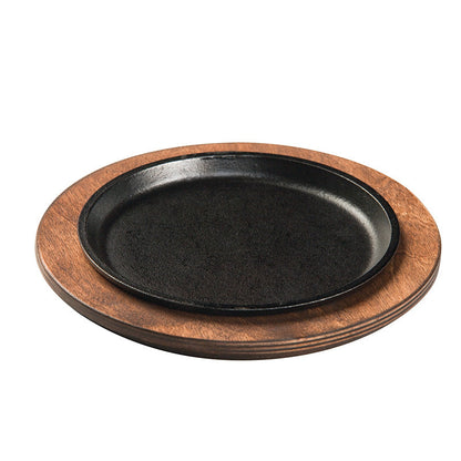 Serving griddle on wooden underliner.