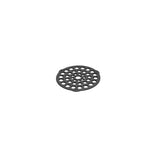 Circular cast iron trivet/meat rack with circle shaped perforations.