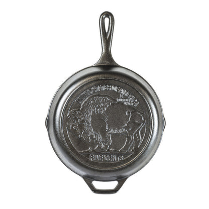 A black cast iron skillet featuring a buffalo design and the text 'Buffalo Nickel'.