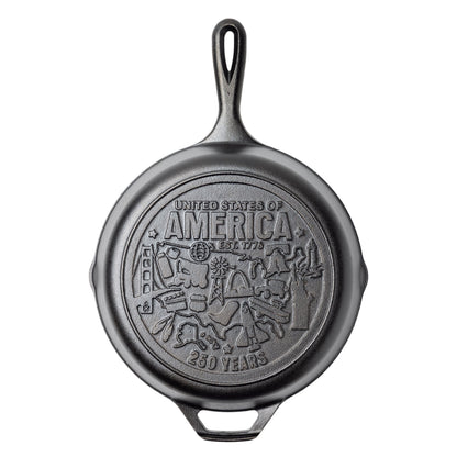 Cast iron skillet with engraved design on back featuring monuments and icons from around the country.