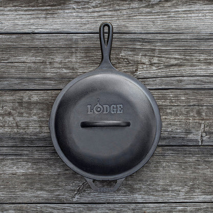 Top view of lid on skillet, displaying branding and handle.