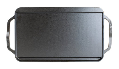 Top view featuring the griddle side showing slot for grease to fall and a constructed handle shape for easy use on each side.