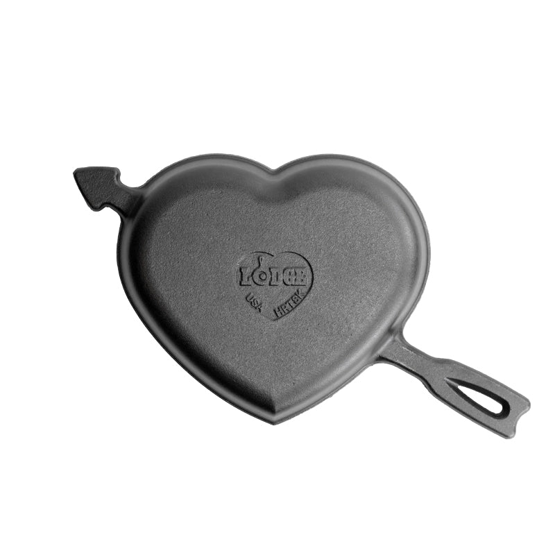 Bottom view of heart-shaped pan, with Lodge logo in heart indent.