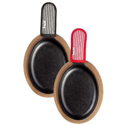 Top view of set showing the cooking area and the fabric handle holder patterns, one is red with white strips, the other is black with white stripes.