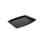 Black griddle shaped similar to a tray, with slightly rounded sides.