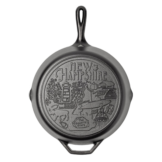 Cast iron skillet with the bottom engraved with beloved icons and monuments from New Hampshire.